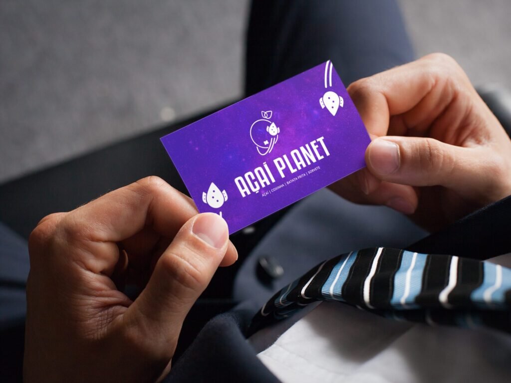 business-card-mockup-featuring-a-businessman-holding-a-business-card-a6141