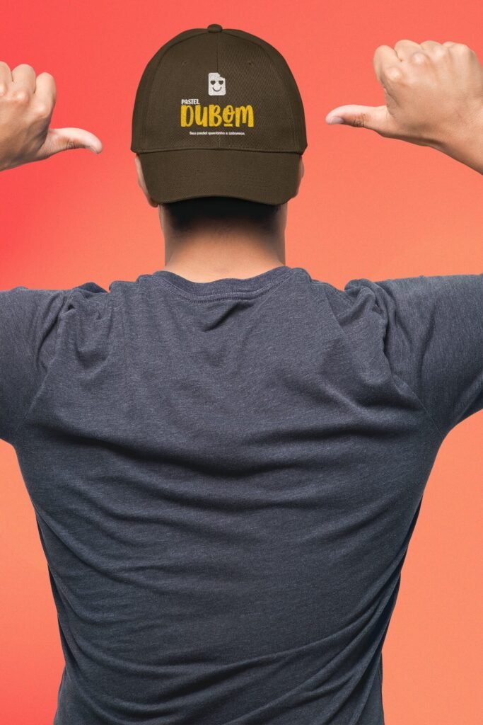 mockup-of-a-man-wearing-a-dad-hat-backwards-and-pointing-at-it-27044